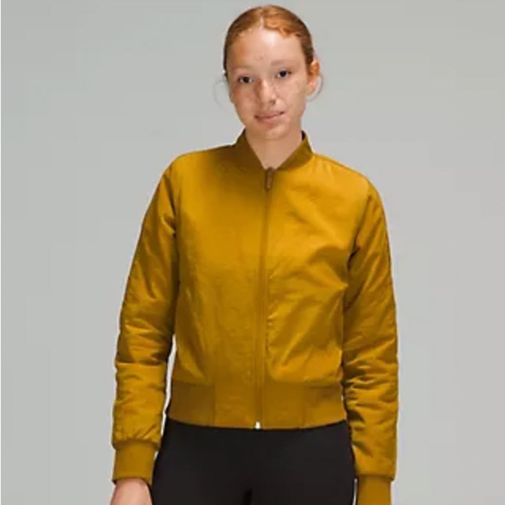 Gently used Lululemon Non-Stop Bomber Jacket in gold